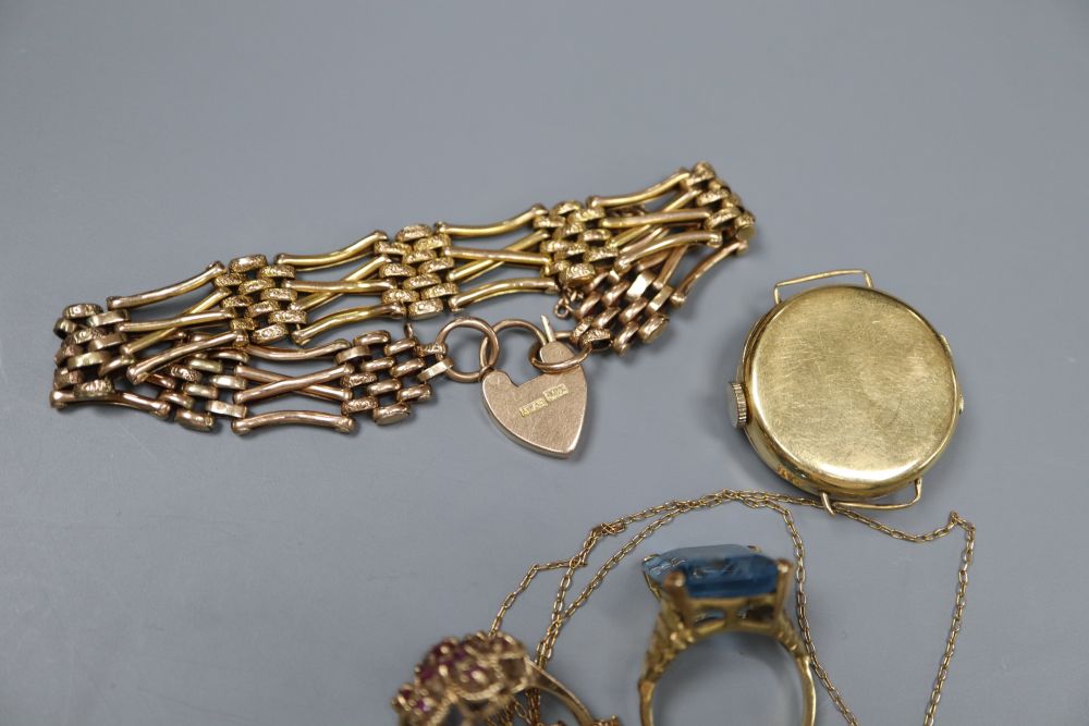 A 9ct gold gate-link bracelet, two 9ct and gem set rings, a 9ct fine chain and a ladys 18ct gold wrist watch.